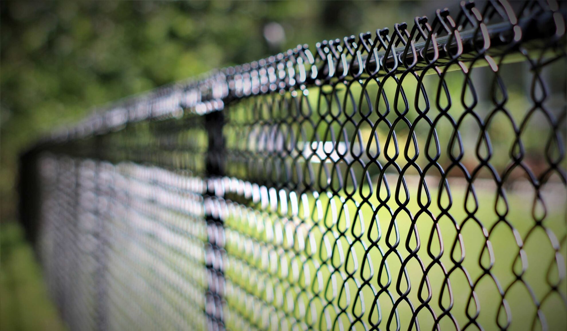 chain link fence close up installed at house exteriors calera ok